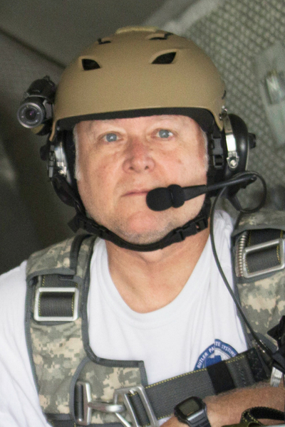 Tim McCord geared up and inside an airplane