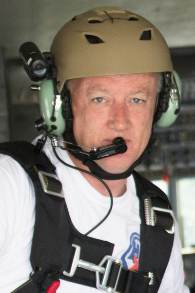 Tom Fowler geared up inside an airplane